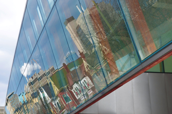 reflections of Dundas St. in the windows of the art gallery of Ontario