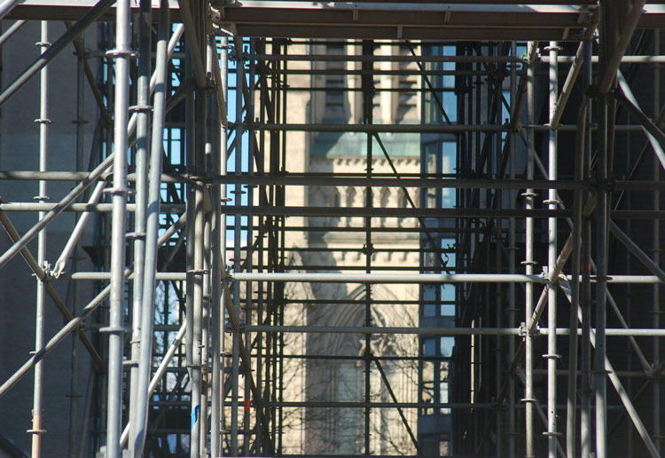 the front of St. James cathedral seen through scaffolding 
