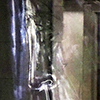 a woman is sitting on a subway car when it is stopped at Union station, the door of the car is open, and this scene is reflected in the glass panels of the art on the wall at the station. 