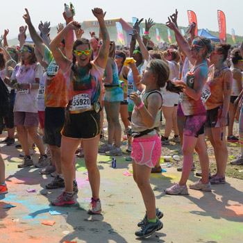 some happy people celebrating at the end of the race 