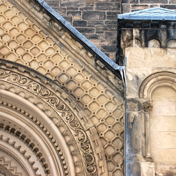 Detail of the stonework in the arch over a doorway at University College, University of Toronto