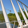 bridge over a creek at Humber Bay Park.  construction of a new condo in the background.  